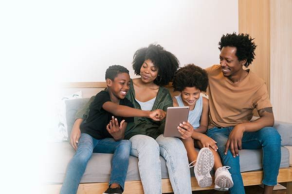 Woman Checking Home Alarm System
